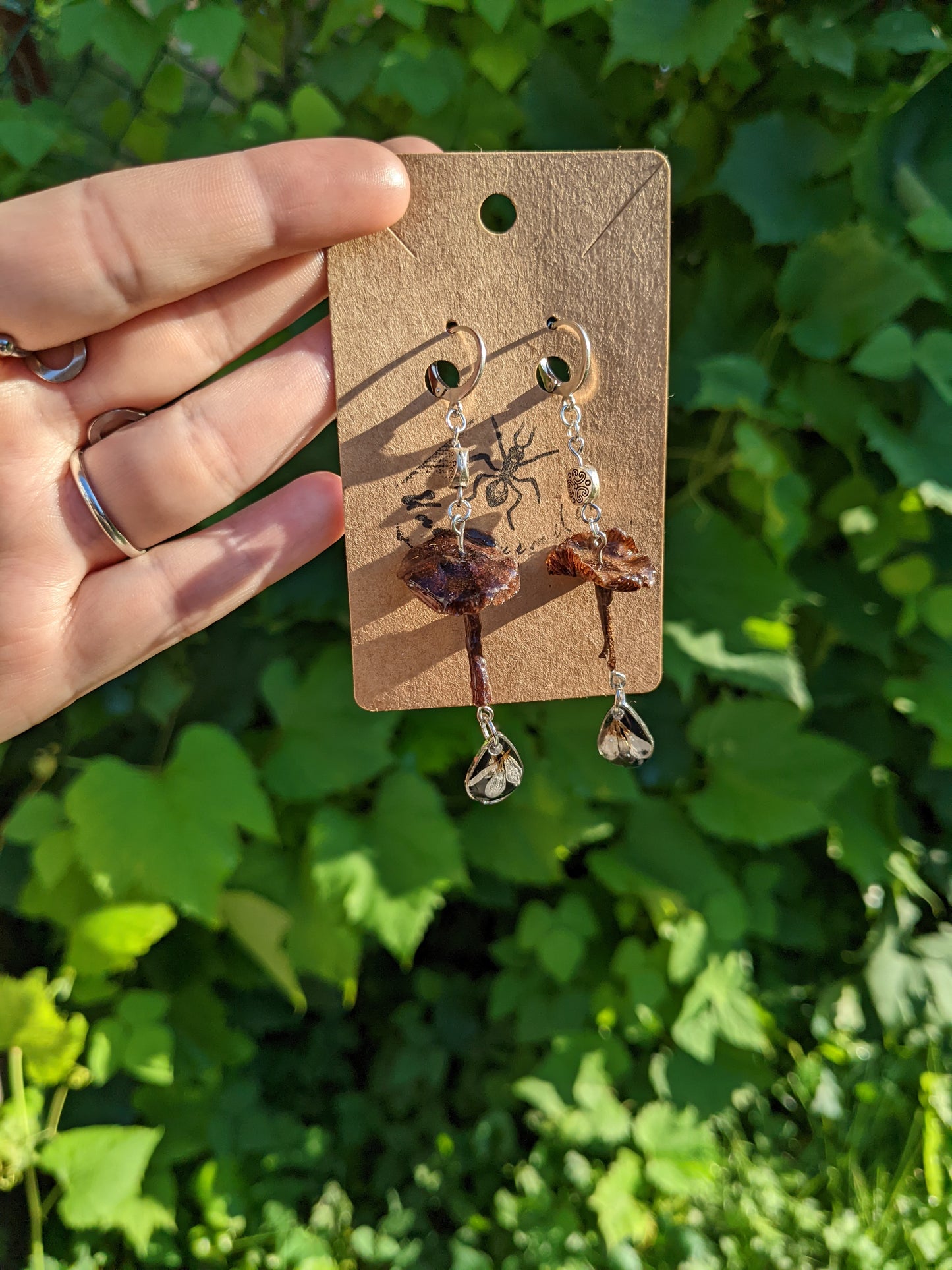 Dark mushrooms & daisy petals charms